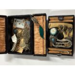 A leather jewel box containing a quantity of antique and later jewellery items including Georgian