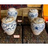 An associated set of four Chinese blue and white vases, similar to the preceding lot; each one