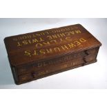 A retailer's counter-top Dewhurst's Sylko cotton thread chest of two drawers, with gilt lettering,
