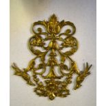 Two ornate cast brass floral and scroll door ornaments flanked by birds, 37 x 34 cm