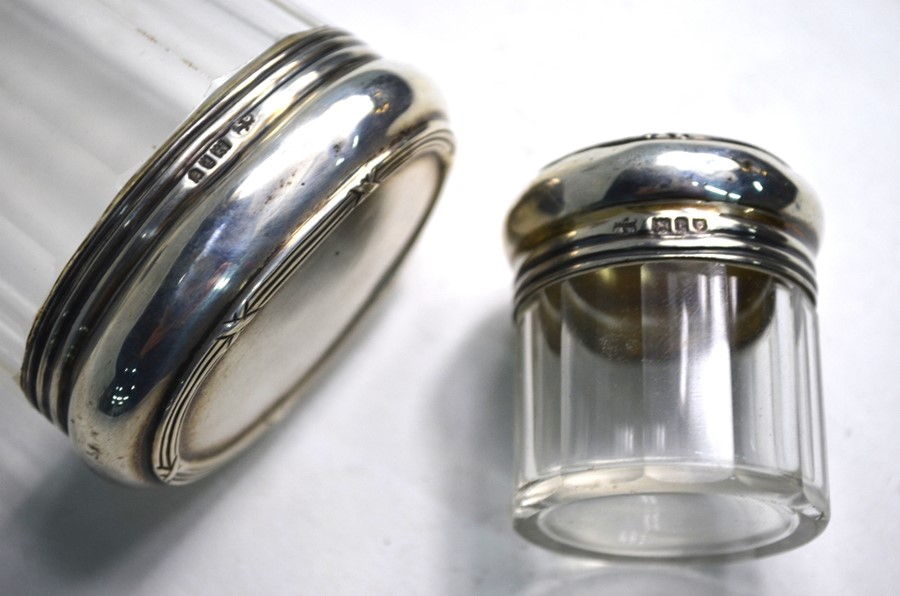 Eight silver-topped cut glass toilet bottles and jars, W & G Neal, London 1910 - Image 4 of 4