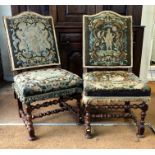 A pair of 18th/19th century walnut framed barley twist side chairs, the hump backs and overstuffed