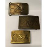 Three heavy cast brass belt buckles, branded CSA; Pony Express; Wells Fargo (3)