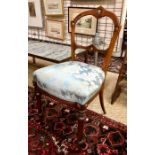 A companion 'His & Hers' inlaid walnut open armchairs with  blue floral upholstery to/with six