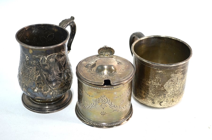 A late Victorian silver baluster Christening mug in the Georgian manner, chased and embossed with