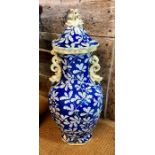 A large Victorian Staffordshire Chinese style octagonal baluster vase and cover, twin handles and
