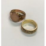 A 9ct rose gold signet ring, size R, approx 7g to/w a three-coloured metal wedding band stamped