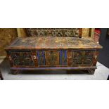 A 19th century Scandinavian coffer with floral decorated panels, on bracket feet, 170 cm wide