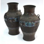 A pair of Japanese metal and enamel vases, decorated in the Chinese style with archaistic motifs and