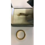 A 22ct yellow gold court style wedding band sizer O/P approx 4.9g to/w a five stone old cut