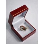 A silver and enamel miniature snail Mark Houghton Ltd., Sheffield 2001, 2 cm high