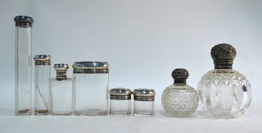 Eight silver-topped cut glass toilet bottles and jars, W & G Neal, London 1910 - Image 2 of 4