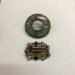 Two Scottish agate brooches, one circular and one rectangular, both silver mounted (2)