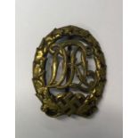 A WWII Nazi German DRL sports badge, bronze grade, maker Ernst L Muller Forzheim, with pin intact