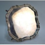 A pie-crust letter salver with moulded rim, on four hoof feet, Barker Brothers, Chester 1918, 13.2