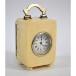 A silver-mounted ivory boudoir clock with French movement, London 1911, 9.5 cm high