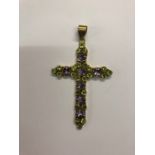 A large cross set overall with amethysts and peridot, stamped 925, 8.5 x 5 cm, in fitted case