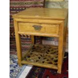 A Chinese elm square side table with frieze drawer, on square supports with lattice undertier