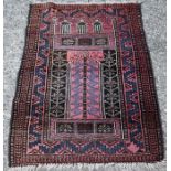 An Afghan Baluch prayer rug, circa 1920, with repeating boders, 130 x 93 cm [369]