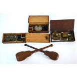 Three 19th century sets of oak-boxed pocket scales, to/w two other sets of scales in 'guitar'