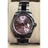 A lady's stainless steel Rolex Oyster Perpetual Datejust with pink dial, serial no. 9J944024 -