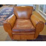 A French vintage tan leather armchair