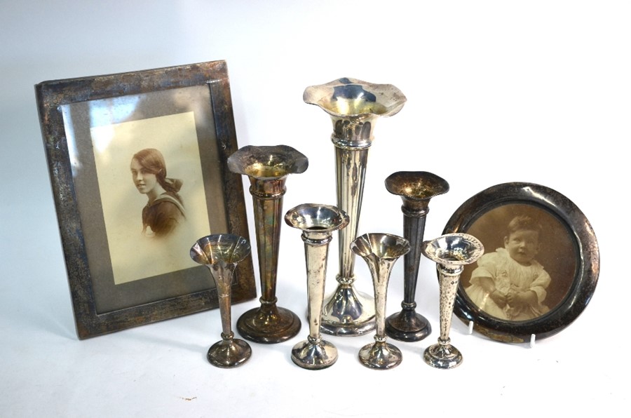 Seven various loaded silver specimen vase flutes, to/w two silver photograph frames - various makers