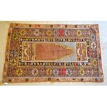 An old Turkish Milas prayer design rug,  brown/camel ground, 1.66 x 1.04 m