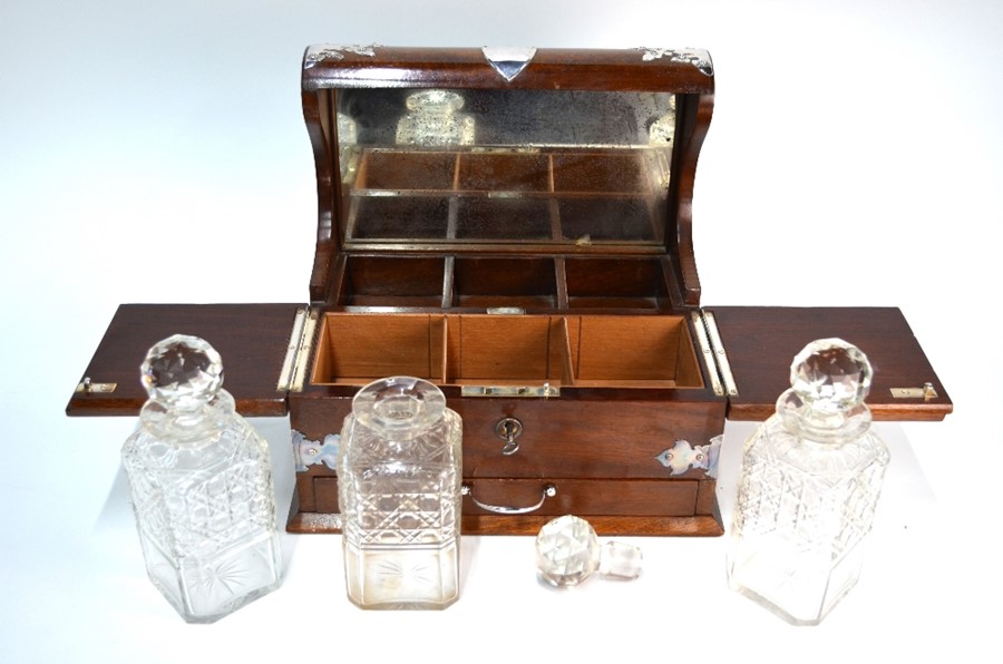 A mahogany tantalus with electroplated mounts, fitted with three square cut glass decanters, cigar - Image 2 of 2