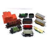 An extensive collection of Hornby O'gauge clockwork railway locomotives, rolling stock, track and