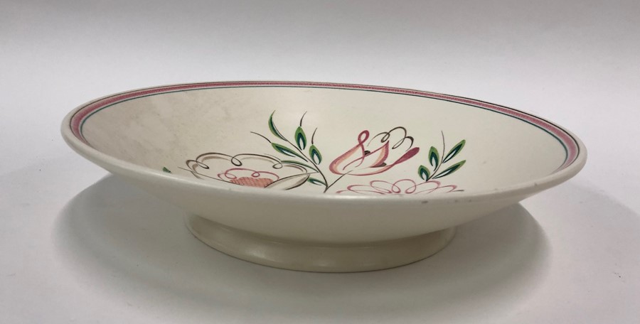 A Poole Pottery large bowl simply decorated in pink colourways with three flowers by Jean Cockram ( - Image 2 of 3