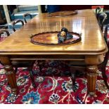 A mid 19th century mahogany extending dining table the moulded top with rounded corner with four