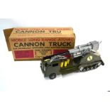 A boxed Marx Toys Atomic Cannon Truck - large tinplate and plastic half-track with three missiles,