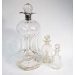 A blown glass 'glug glug' whisky decanter with four-lipped silver collar, William Hutton & Son, B