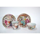 A Chinese Export teabowl and saucer, each one decorated with a Manchu/Chinese scholar with his