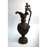 A large 19th century Italian brown patinated bronze ewer in the Renaissance manner, the handle