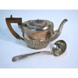 A late Victorian silver oval half-reeded bachelor teapot, London 1900, 7.1 oz gross, to/w a Scottish
