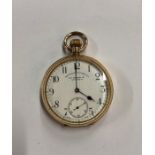 A gentleman's vintage 18k open-faced pocket watch with 18k dust-cover enclosing Omega Swiss top-wind