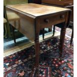 A George III mahogany Pembroke table, the drop leaf top with edge over a frieze drawer to one end