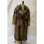 A 'Dinni' charcoal grey/brown tipped white fox fur full length coat, retailed by Femina Furs,