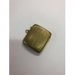 A Victorian rectangular 9ct yellow gold vesta case, engine turned decoration overall, London 1862, 5