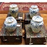 An associated set of four Chinese blue and white oviform vases; each vase about 16 cm high, and with