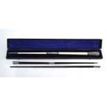 An Edwardian silver-mounted ivory conductor's baton, London 1903, 48 cm, in presentation case (