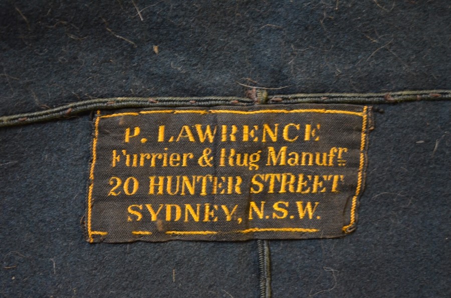 An early 20th century Australian fur rug with felt backing, label for 'P Lawrence, Furrier and Rug - Image 3 of 3