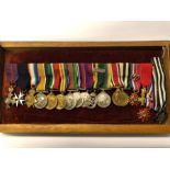 A miniature group of fifteen medals attributed to Liet. Co. E.J.M. Eldridge, OBE TD comprising - OBE