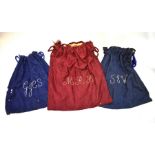 Three vintage damask bags embroidered with initials, used to store barristers' robesOne blue