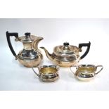 A heavy quality silver four-piece tea service with hot-water jug, in the Georgian manner, Viners,