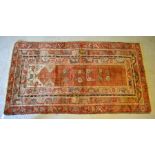 An old Anatolian Milas runner, the geometric prayer design on brown-camel ground, 2.30 x 1.28 m