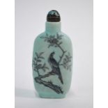 A Chinese snuff bottle, decorated with a stag beside a gnarled tree, and a bird perched beside
