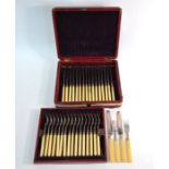 A George IV red morocco-bound cased set of twelve each silver dessert knives and forks with ivory